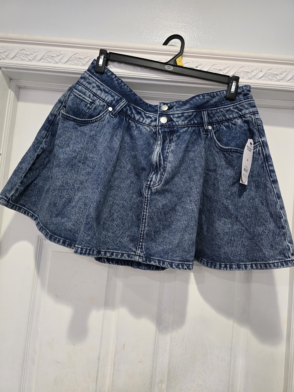 Denim Mini Skirt in Faded Blue with Flared Silhouette